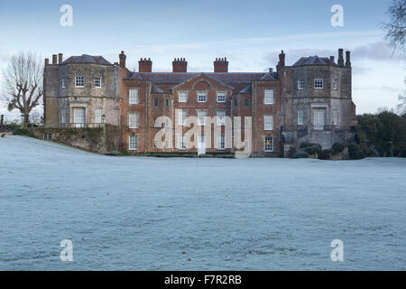 The house at Mottisfont, Hampshire, in the winter. The house was a Tudor mansion remodelled in the 1740s into a comfortable Georgian home. The garden features ancient trees, babbling brooks and rolling lawns. Stock Photo