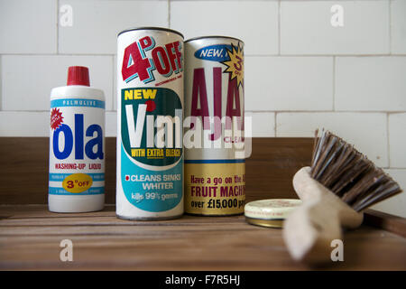 Cleaning products on the wooden draining board in the scullery at Anglesey Abbey, Gardens and Lode Mill, Cambridgeshire. Stock Photo