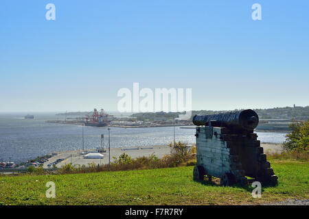 An old ancient canon sits on top of a hill where Fort Howe was built in 1777  to guard passage into the Saint John harbor Stock Photo