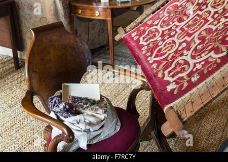 Detail of the Drawing Room at Hardwick Hall, Derbyshire. Hardwick Hall was built in the late 16th century for Bess of Hardwick. Visible are the Duchess' needlework bag and a piece of her embroidery. Stock Photo