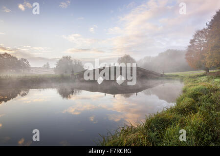 The Oxford Bridge at Stowe, Buckinghamshire. Stowe is an 18th century landscaped garden, and includes more than 40 historic temples and monuments. Stock Photo