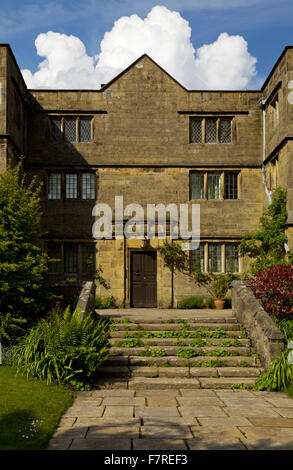 The front of Eyam Hall and Craft Centre, Derbyshire. Eyam Hall is an unspoilt example of a gritstone Jacobean manor house, set within a walled garden.