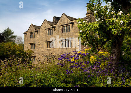 The garden at the front of Eyam Hall and Craft Centre, Derbyshire. Eyam Hall is an unspoilt example of a gritstone Jacobean manor house, set within a walled garden.
