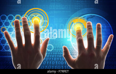 Hands touching holographic screen Stock Photo