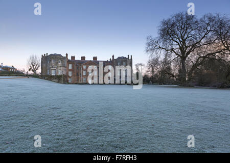 The house at Mottisfont, Hampshire, in the winter. The house was a Tudor mansion remodelled in the 1740s into a comfortable Georgian home. The garden features ancient trees, babbling brooks and rolling lawns. Stock Photo