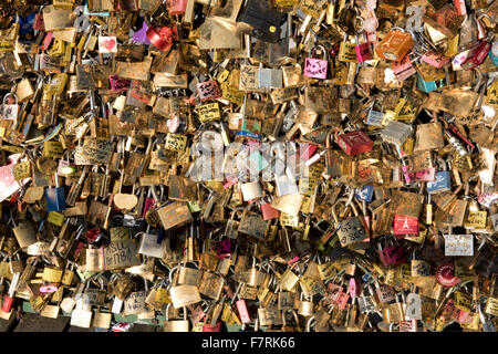 'Love Locks' on a railing near the Ponte des Arts; Paris, France Stock Photo