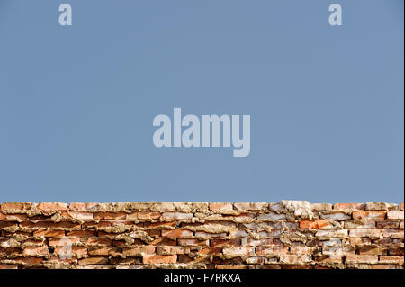 Blue Sky and Old Wall Background Stock Photo