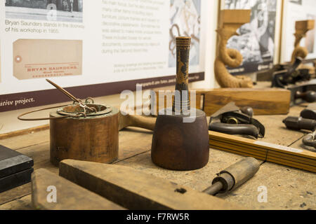 Tools at Grange Barn, Essex. One of Europe's oldest timber-framed buildings, Grange Barn stands as a lasting reminder of the once powerful Coggeshall Abbey. Stock Photo