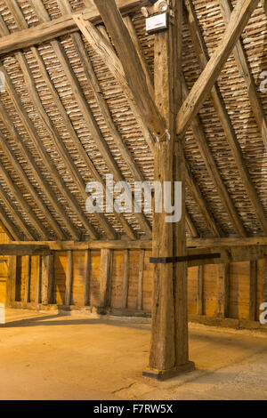 Inside Grange Barn, Essex. One of Europe's oldest timber-framed buildings, Grange Barn stands as a lasting reminder of the once powerful Coggeshall Abbey. Stock Photo