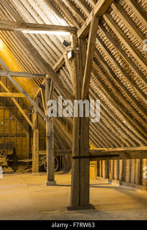 Inside Grange Barn, Essex. One of Europe's oldest timber-framed buildings, Grange Barn stands as a lasting reminder of the once powerful Coggeshall Abbey. Stock Photo