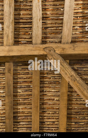 Inside Grange Barn, Essex. One of Europe's oldest timber-framed buildings, Grange Barn stands as a lasting reminder of the once powerful Coggeshall Abbey. Stock Photo