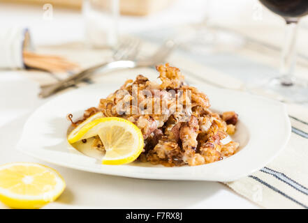 Fried squid typical Spanish tapa Stock Photo