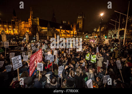 London, UK. 2nd December, 2015. Stop The War Protest outside Westminster Parliament buildings ahead of the vote on extending airstrikes against Isis to Syria Credit:  Guy Corbishley/Alamy Live News Stock Photo
