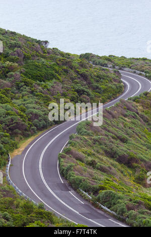 Enjoyable curves of Great Ocean Road in Victoria province of Australia.  Scenic drive along the Surf Coast. Stock Photo