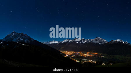 Landscape in the moonlight, Fulpmes at night under the starry sky, Serles at the front, Kalkkögel behind, Stubai Alps Stock Photo