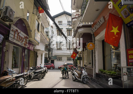 Hanoi, Vietnam: A typical street scene in Hanoi's vibrant Old Quarter. Stock Photo