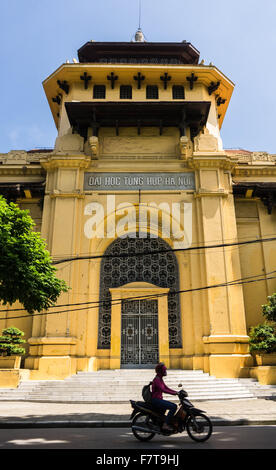 Hanoi, Vietnam: A motorcycle passes in front of the university in Hanoi's French Quarter. Stock Photo