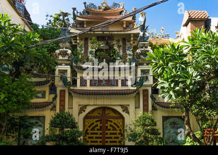 Hanoi, Vietnam: An small ornate temple on a street in Hanoi's Old Quarter Stock Photo