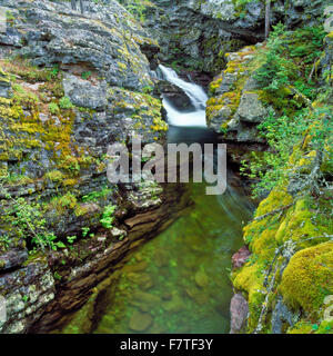 waterfall spilling into a narrow gorge on the upper jocko river near arlee, montana Stock Photo