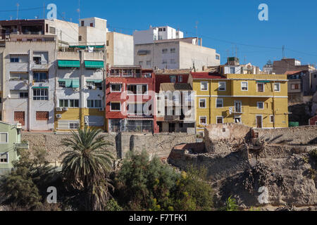 La Vila Joiosa or Villajoyosa, Alicante, Spain. A coastal resort with colorful fishermans houses on top of cliff steep hill Stock Photo