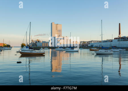 Cameco Fuel Manufacturing Inc. and sailboats at the Port Hope Harbour. Port Hope, Ontario, Canada. Stock Photo