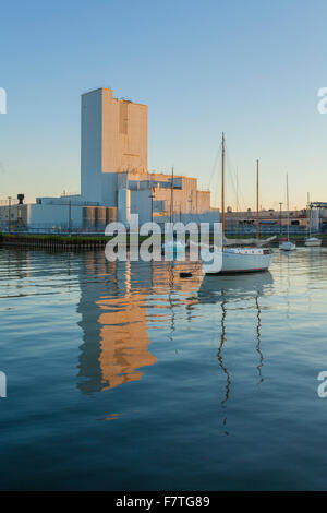 Cameco Fuel Manufacturing Inc. and sailboats at the Port Hope Harbour. Port Hope, Ontario, Canada. Stock Photo