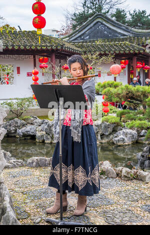 Chinese flute player, Dr Sun Yat Sen Garden, Chinese New Year Celebration, Vancouver, British Columbia, Canada Stock Photo