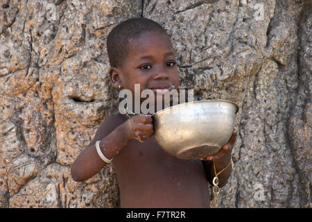 Tamberma child eating porridge, Koutammakou, 'Land of the Batammariba,' Togo Stock Photo