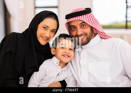 happy Muslim family spending time together at home Stock Photo