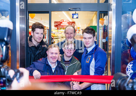 Louth, Lincolnshire, UK. 3rd December, 2015. Aldi supermarket flagship store Grand opening in Louth, Lincolnshire UK, 3/12/2015 The UK's largest Aldi shop building. Customers queueing outside for golden envelope for first 100 prizes given inside boys cut the ribben to open Credit:  Tommy  (Louth)/Alamy Live News