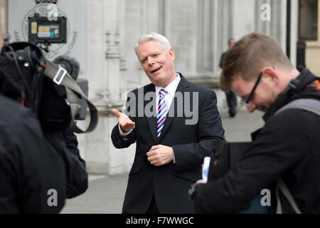 Clive Mason, deaf British TV presenter, using sign language to camera in an outside broadcast in London, 2015 Stock Photo