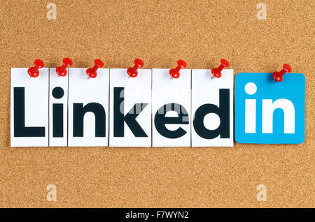 Kiev, Ukraine - October 07, 2015: Linkedin logo sign printed on paper, cut and pinned on cork bulletin board. Stock Photo