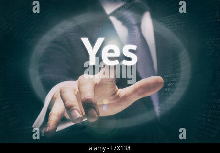 Businessman pressing a Yes concept button. Stock Photo