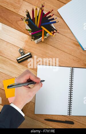 Composite image of hand writing with a pen Stock Photo