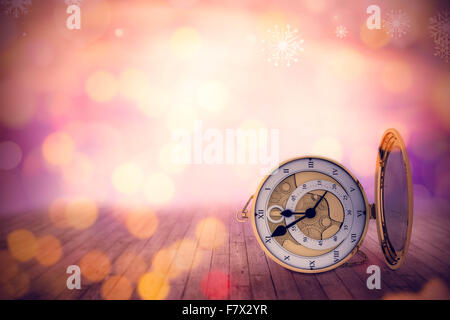 Composite image of retro styled pocket clock with mirror Stock Photo