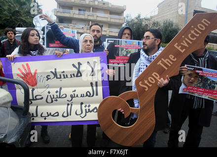 Jerusalem, Jerusalem, Palestinian Territory. 3rd Dec, 2015. Palestinians of the familySub Laban, take part in a protest in front of the EU headquarters to demand their protection from the Jewish settlers who are trying to takeover their house in the Old City of Jerusalem, on Dec. 03, 2015 Credit:  Mahfouz Abu Turk/APA Images/ZUMA Wire/Alamy Live News Stock Photo
