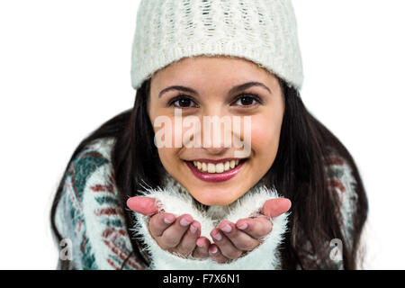 Attractive woman blowing kiss to the camera Stock Photo