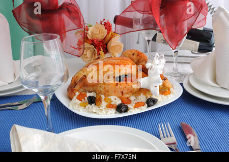 Grilled Chicken with rice and dried fruit on the dining table Stock Photo