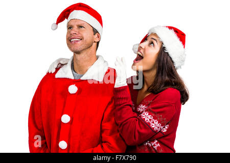 Festive couple looking up together Stock Photo