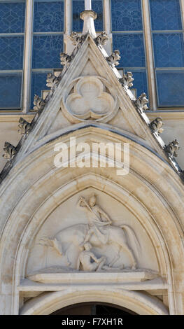 Bas relief over the door to Neo Gothic Parish Church of Saint Martin at Bled lake in Slovenia Stock Photo