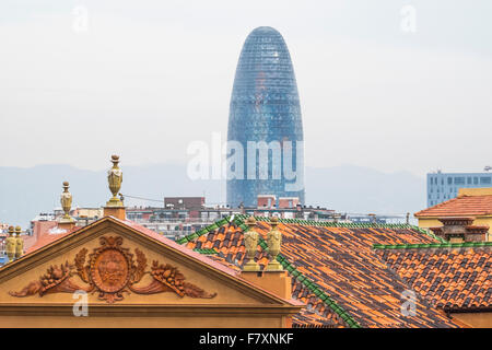 Torre Agbar or Agbar Tower, a 142 metre skyscraper designer by architect Jean Nouvel located in Glorias Square, Barcelona, Spain Stock Photo