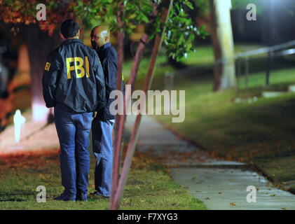 San Bernardino, California, USA. 2nd Dec, 2015. FBI agents investigate the surrounding area for evidence in Redlands following a shooting at Inland Regional Center where at least 14 people were killed and 17 wounded. Reportedly three shooters went on a shooting rampage with rifles wearing ski masks and vests. A man and a woman connected to the shooting were killed in a firefight with police officers after a car chase. Credit:  Steven K. Doi/ZUMA Wire/ZUMAPRESS.com/Alamy Live News Stock Photo