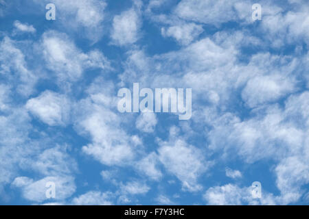 soft thin white wispy clouds against blue sky. A soft relaxing nature image. Stock Photo