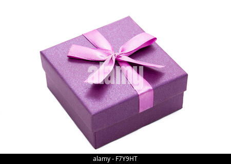 Violet gift box with ribbon isolated on white background Stock Photo