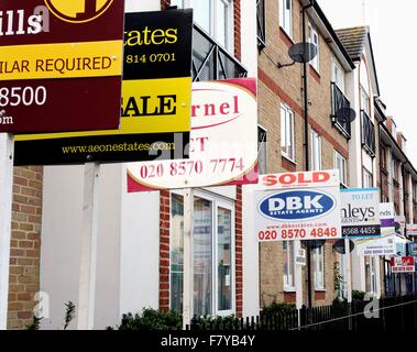Estate agents boards on residential apartments in Hounslow west London Stock Photo