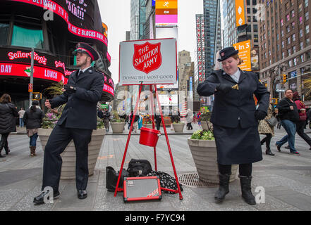 New York, USA. 3rd December, 2015. The Christmas season begins in New York City. The 83rd Rockefeller Center Christmas tree was lit safely amid concerns of terrorisim. Shoppers are busy in Times Square  in stores like Toys R Us wich will close in three weeks because of a rent increase. Christmas in New York City  is still a special time for many New Yorkers and for people from all over the world even with the concerns of the Paris terrorist attacks being repeated in Manhattan. Credit:  Scott Houston/Alamy Live News Stock Photo