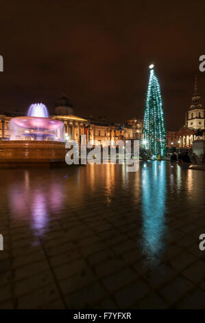 London, UK.  3 December 2015.  The newly lit Christmas tree in Trafalgar Square.  The Norwegian spruce tree is donated annually by the City of Oslo to the people of London each year as a token of gratitude for Britain’s support during the Second World War. Credit:  Stephen Chung / Alamy Live News Stock Photo