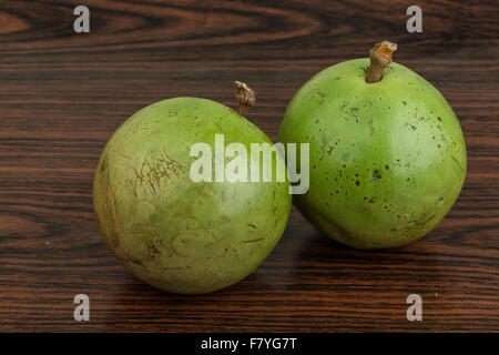 Asian fruit Sapote - on wood background Stock Photo