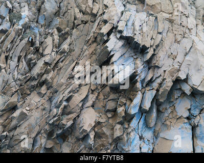 grey mountain rock panorama background - abstract stone formation, folded rocks Stock Photo