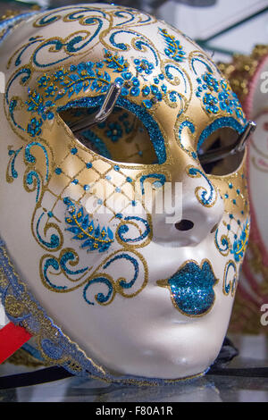 Traditional Venetian carnival white mask in the market on sale in Venice Stock Photo